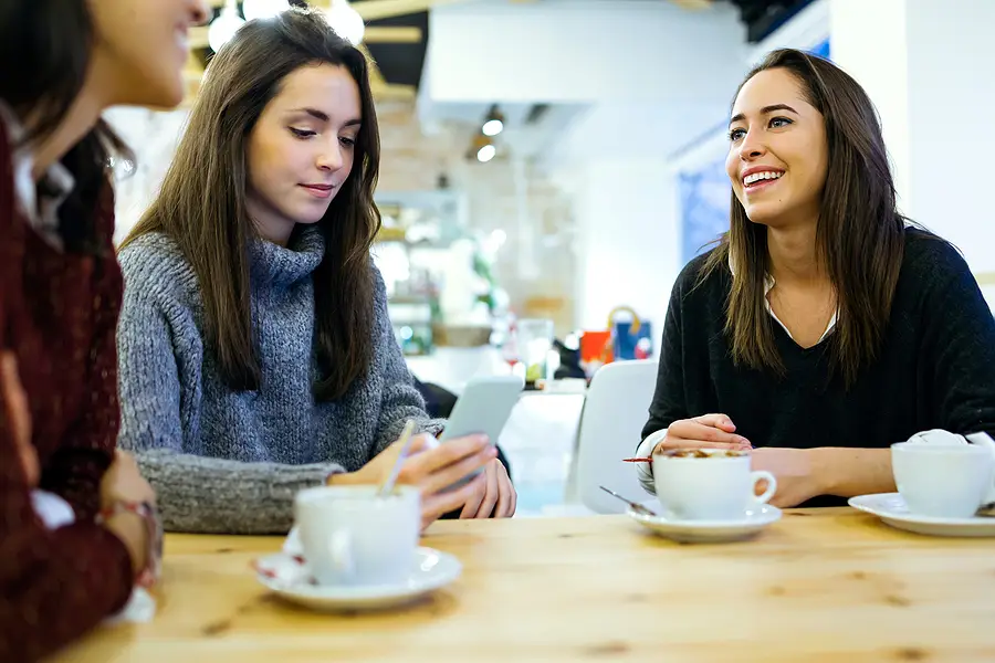 Three Young Professional Women Networking Improve Your Career